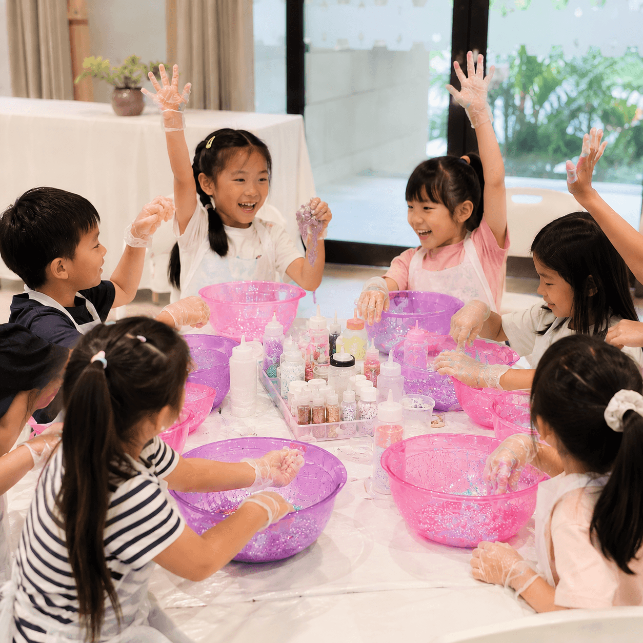 Children enjoying a birthday party activity in Singapore